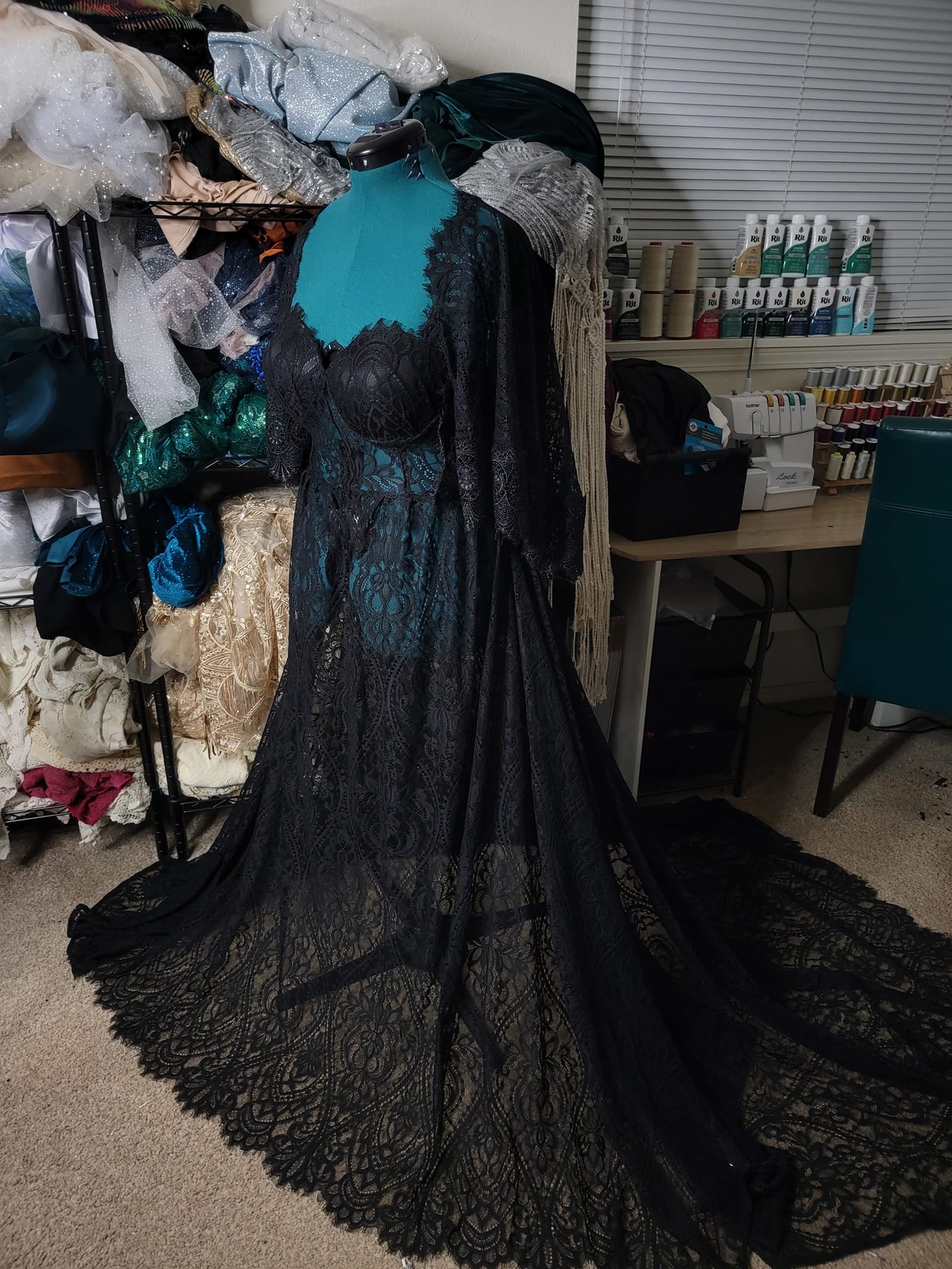 Adjustable size black lace dress with trim detail & flowy sleeves