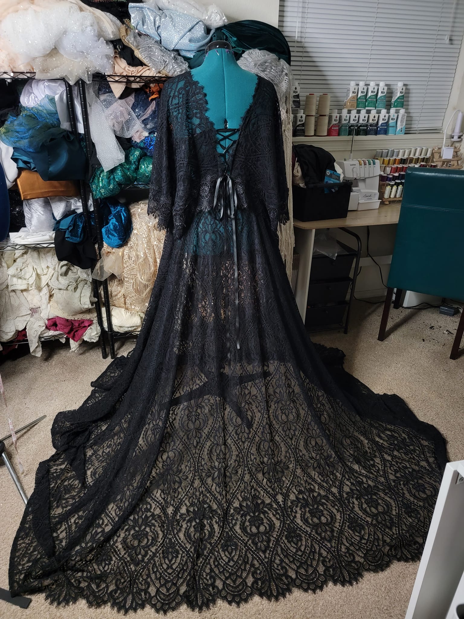 Adjustable size black lace dress with trim detail & flowy sleeves